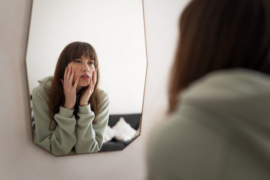 side view woman looking mirror 1024x683 - 51 Proven Ways to Overcome Low Self-Esteem & Shyness [Guide]