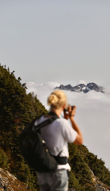 person standing confidently on a mountaintop