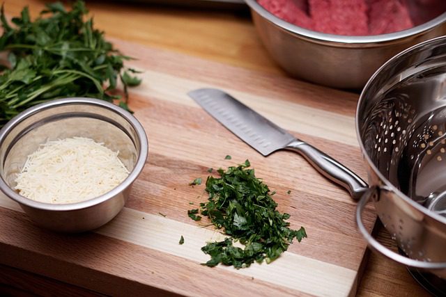 sliced watermelon, cucumber, and celery on a wooden cutting board