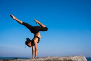 person meditating at sunrise can evoke the calm and discipline